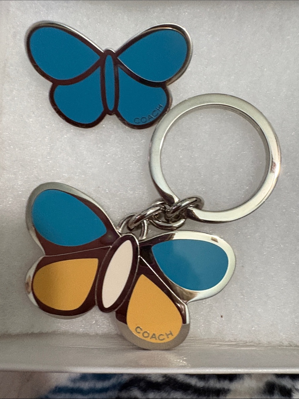 Coach Butterfly Keychain in Teal and Mustard